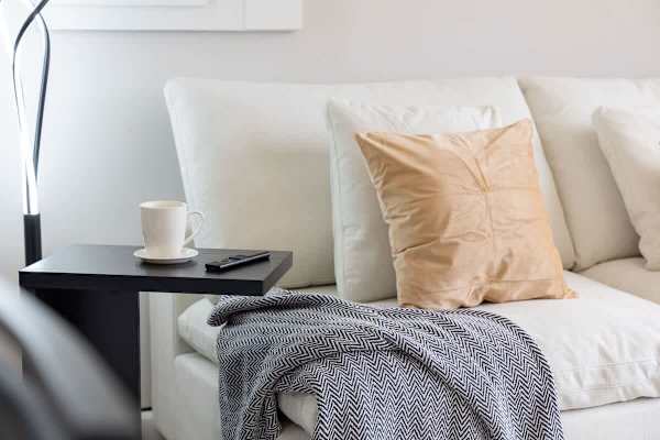 Relax in comfort with plush seating and thoughtful touches, creating a cozy and inviting ambiance for your stay.