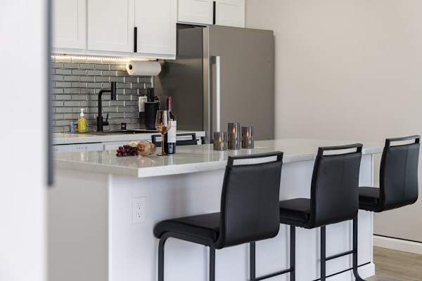Enjoy the convenience and style of a modern kitchen, ready for your morning coffee or evening cocktails.