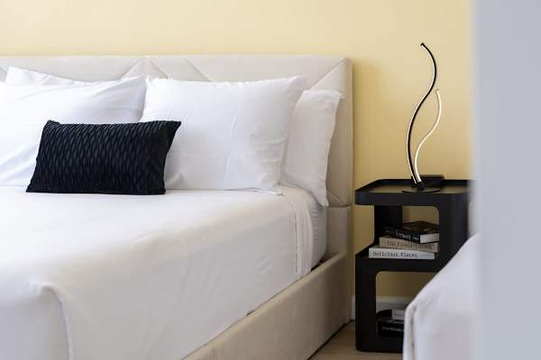Experience restful nights and elegant mornings in a beautifully appointed bedroom designed for your utmost relaxation.