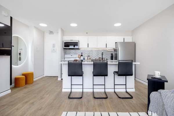 Experience convenient and stylish dining in our unit's well-designed kitchen and dining area, ideal for enjoying meals.