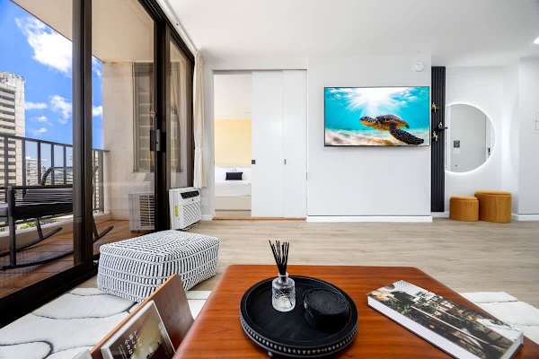 The bedroom and the living area are separated by a sliding door.
