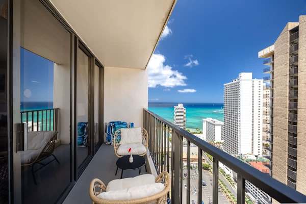 Step onto your private balcony and immerse yourself in the beautiful view of the ocean and vibrant city, where every moment is framed by paradise.