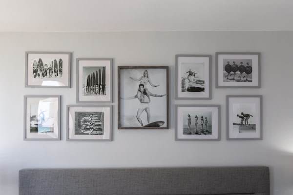 Adding a touch of timeless cool, these vintage surf prints create a unique ambiance for your stay.