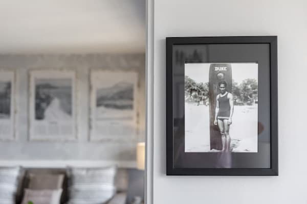 Thoughtful details, like this vintage surf print, enhance the character of your getaway.