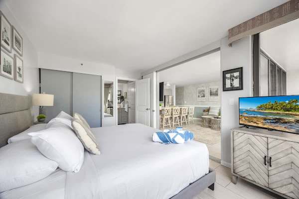 Wake up to paradise in this stunning bedroom retreat, featuring a plush king bed and seamless flow to a stylish living area.
