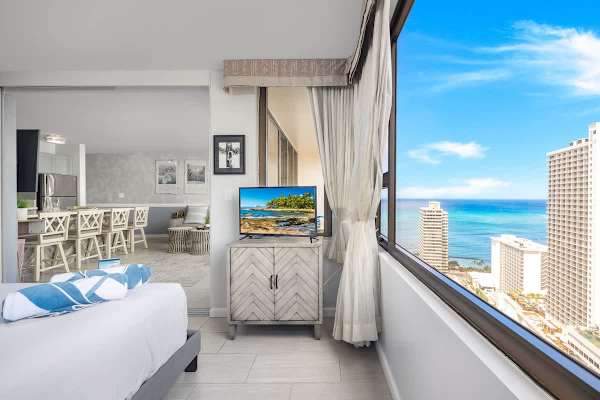Wake up to stunning ocean views from your cozy bedroom, perfect for a relaxing stay.