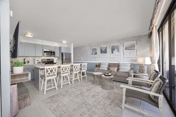 Experience modern comfort in this bright and airy unit, complete with a gourmet kitchen, dining area, and living area.