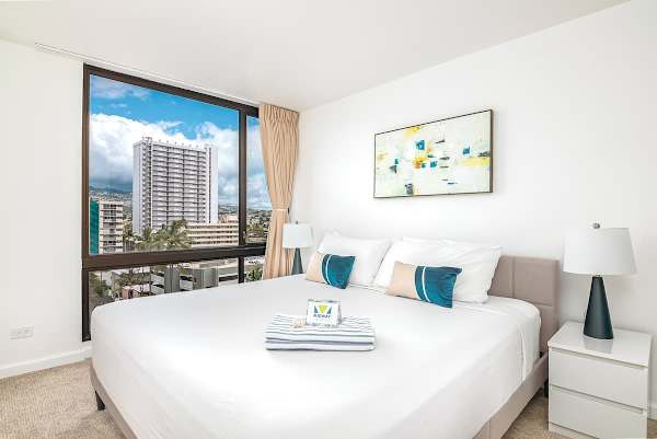 Retreat to your spacious and stylish main bedroom, offering a king-size bed and stunning city views for a restful night's sleep.