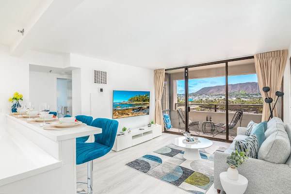 Experience modern comfort and stunning Diamond Head views from this vibrant 2-bedroom condo, perfect for your next getaway!