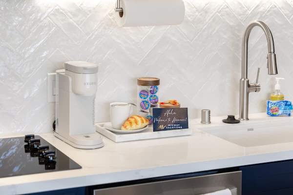 Start your day with a warm welcome and a fresh cup of coffee from the Keurig machine.