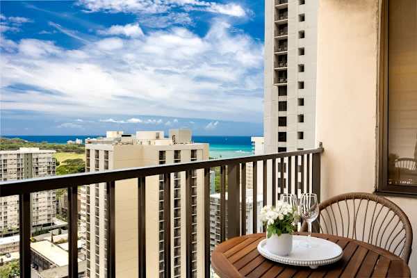Sip, relax, and soak in partial ocean views from your private lanai—just moments from Waikiki Beach and the vibrant island energy below.
