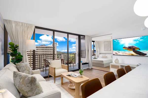 Wake up to stunning Diamond Head and City views and unwind in this bright condo, which features a pull-out sleeper sofa,a  65" smart TV, and easy access to your balcony.