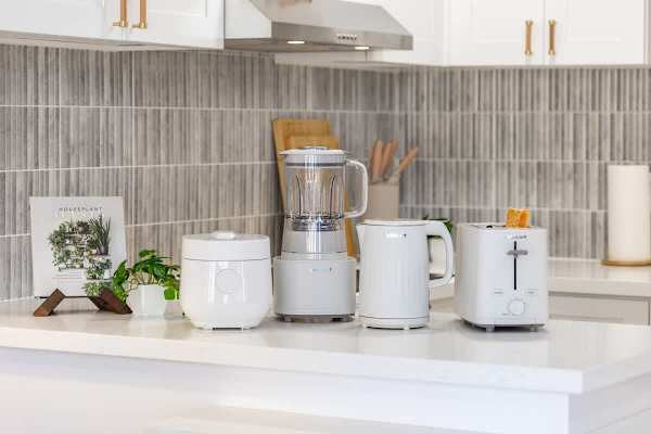 Prepare breakfast with ease using the provided blender, kettle, and toaster—all the essentials for a perfect start to your day.