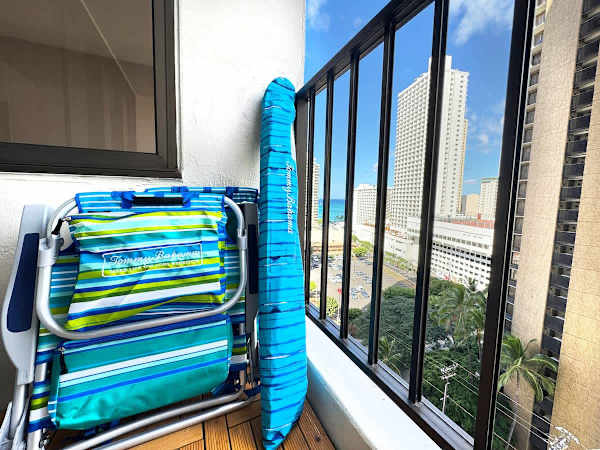 Make your beach day effortless with our provided beach essentials, including two Tommy Bahama beach chairs and a matching umbrella.