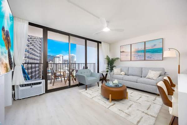 Settle into the comfortable pull-out sleeper sofa in this bright living area, which features a large sliding door leading to a private lanai.