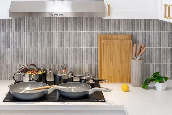 Cook a full meal with ease using the complete set of pots and pans, and cooking utensils, all provided for your culinary needs.