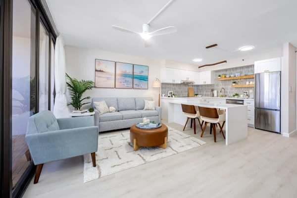 Settle into this bright, open-concept living area with a comfortable pull-out sleeper sofa, a well-appointed kitchen, and a dining space for 4.