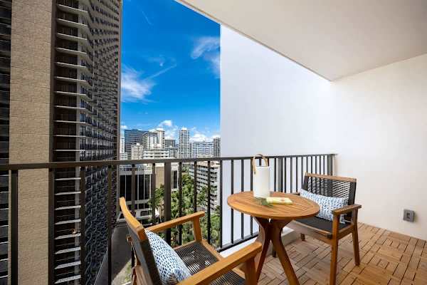 Relax and take in the stunning views from your private lanai, furnished with a small table and two chairs, creating the perfect spot to enjoy your morning coffee or an evening cocktail.