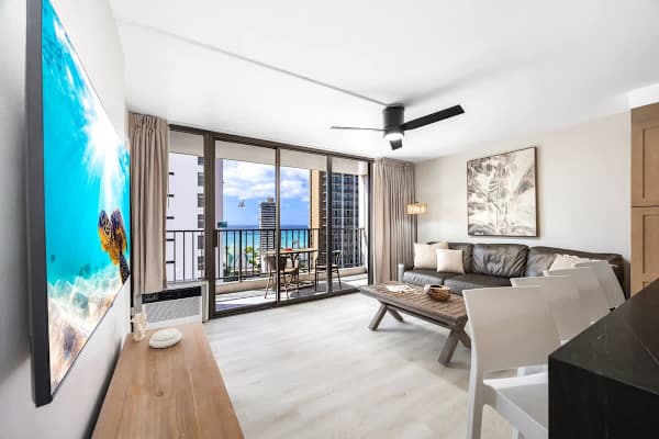 Kick back on the sofa and enjoy the 55" smart TV, or slide open the doors to let in that fresh air and step right out onto your private balcony with its stunning ocean and city backdrop!