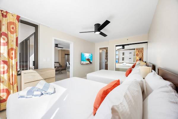 The bedroom is perfectly set up with 2 Queen beds, a 40" TV mounted for easy viewing!