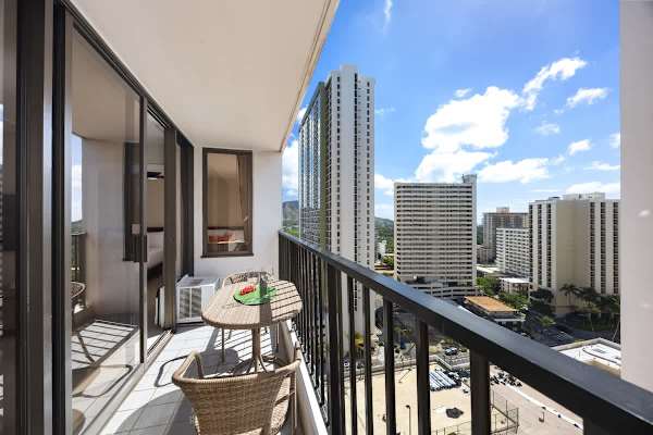Step out onto your private balcony to soak up the sun at the bistro set and enjoy a stunning panorama of the city and blue skies!