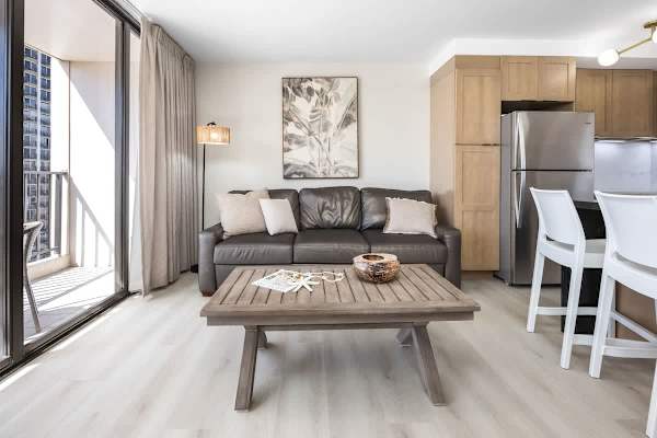 Relax and get comfortable on this inviting sofa, perfectly situated next to the balcony and featuring a coffee table for that perfect vacation feel!