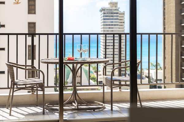 Step through the glass doors onto your private balcony, set up with a delightful bistro table and chairs, where you can sip your favorite drink and enjoy that beautiful view of the city and the sparkling ocean!
