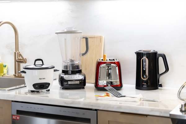 You'll find everything you need to prepare meals in your fully stocked kitchen, including handy countertop appliances like a rice cooker, blender, toaster, and electric kettle!