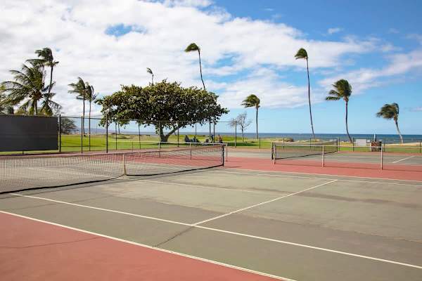 Serve and volley on the on-site tennis courts, enjoying a refreshing game surrounded by swaying palm trees and a stunning view of the ocean.