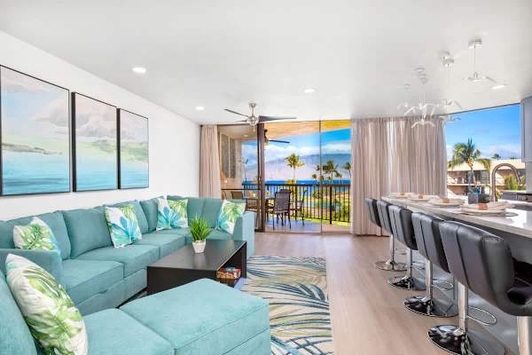 Experience oceanfront luxury with vibrant, tropical decor and a seamless transition to a stunning view from your private lanai in this beautiful, fully renovated condo!