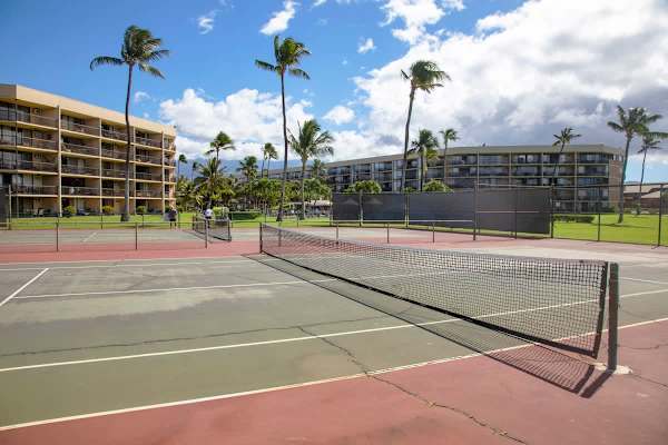 Serve and volley on the on-site tennis courts, enjoying a refreshing game surrounded by swaying palm trees and a stunning view of the ocean.