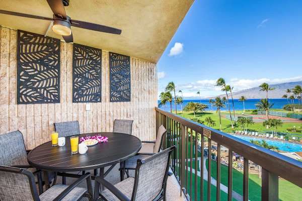 Savor the stunning resort and ocean views while dining on your private lanai, complete with ample seating and a refreshing ceiling fan.