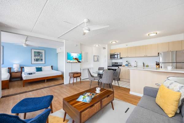 Enjoy an open-concept living area that can be conveniently separated from the bedroom by a sliding door for added privacy.
