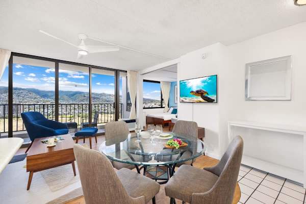 Enjoy dinner with a view at the 4-person dining table, perfectly positioned to take in the breathtaking mountain views while you catch up on shows on the 42" smart TV.