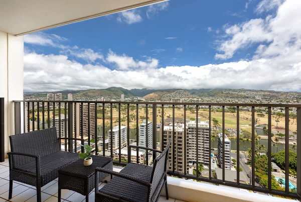Take in the stunning panoramic mountain and city views from your private balcony, the perfect spot for your morning coffee.