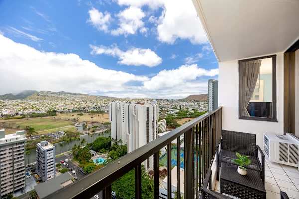 Soak up the stunning mountain and city views from your private balcony, the perfect spot to relax and take in the scenery.