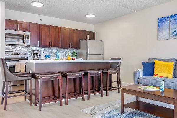 Your dining area with 4 bar stools is perfect for shared meals.