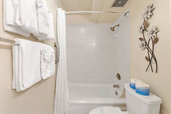 Full bathroom with tub and shower combinations