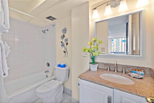 Full Bathroom with tub and shower combination.