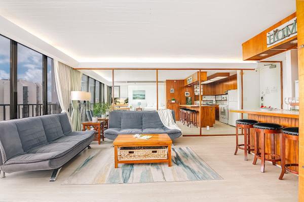 Your living room has 2 recliner futon sofas, and a coffee table perfect for relaxation.