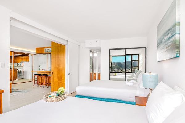 You can have a restful sleep in your bedroom with 2 queen-size beds, a closet, and access to the bathroom.