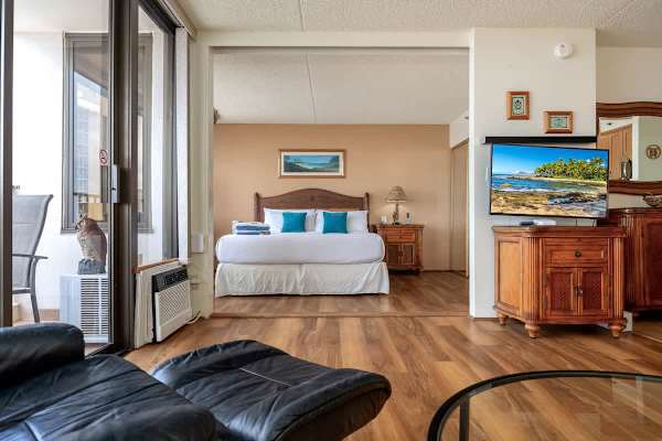 Unwind in comfort on your king-size bed in the bedroom, enjoy entertainment in the living room on the 40" smart TV, and step out onto your private lanai for fresh air and views.