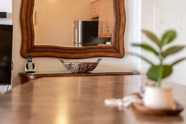 Enjoy casual dining or morning coffee at the stylish breakfast bar, perfectly situated in this inviting open-concept living space.