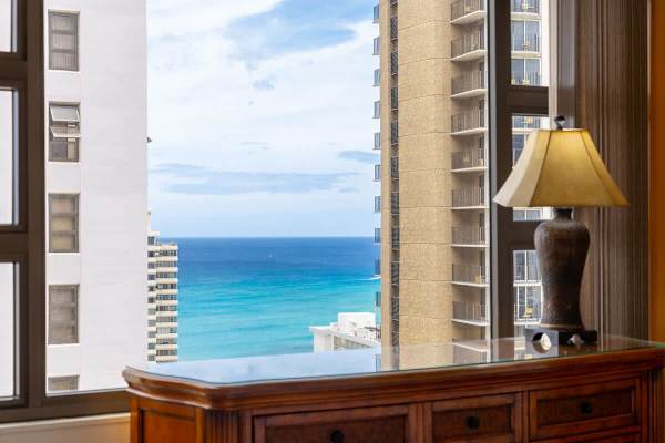 Wake up to stunning ocean views and the vibrant city skyline right from your bedroom.