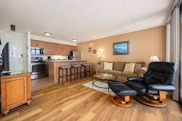 Relax in your stylish open-concept unit featuring a full kitchen, comfy living area, and a prime spot for kicking back after a day of adventure!