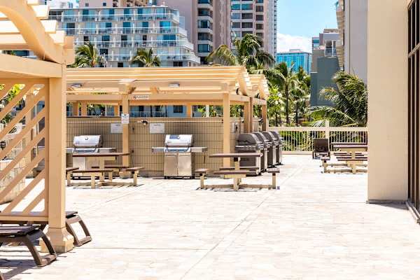 Enjoy outdoor dining and grilling on our shared BBQ area on the 6th floor, complete with multiple grills and picnic tables for your convenience.