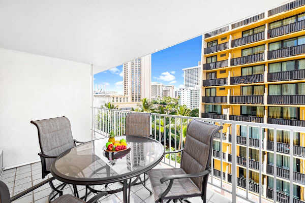 Balcony with table and chairs for up to 4 people.
