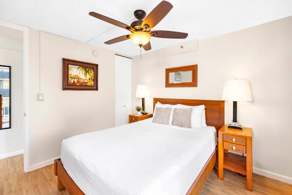 Bedroom with queen-size bed.