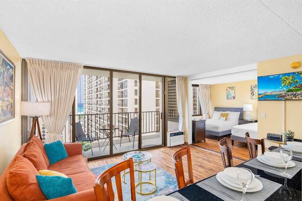 Enjoy your stay in this beautiful condo with city, pool, and partial ocean view.