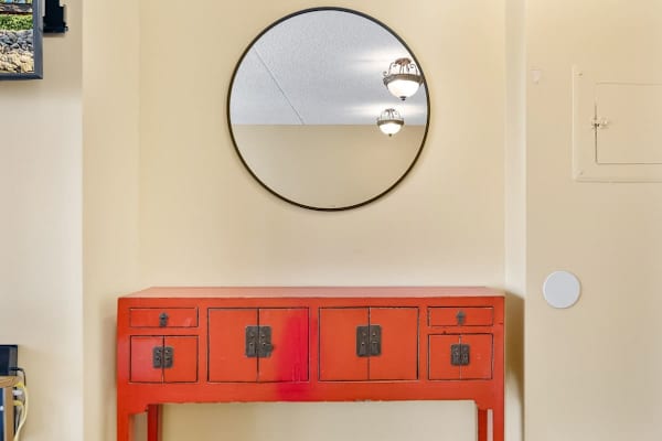 Console table and mirror in the living room.